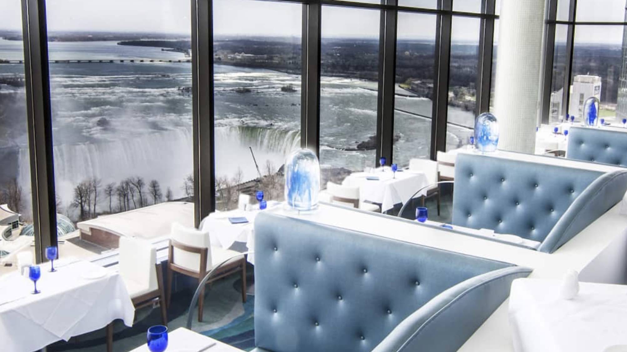  Hilton Niagara Falls:Fallsview Hotel & Suites luxury hotels in niagara falls restaurant seating with falls view