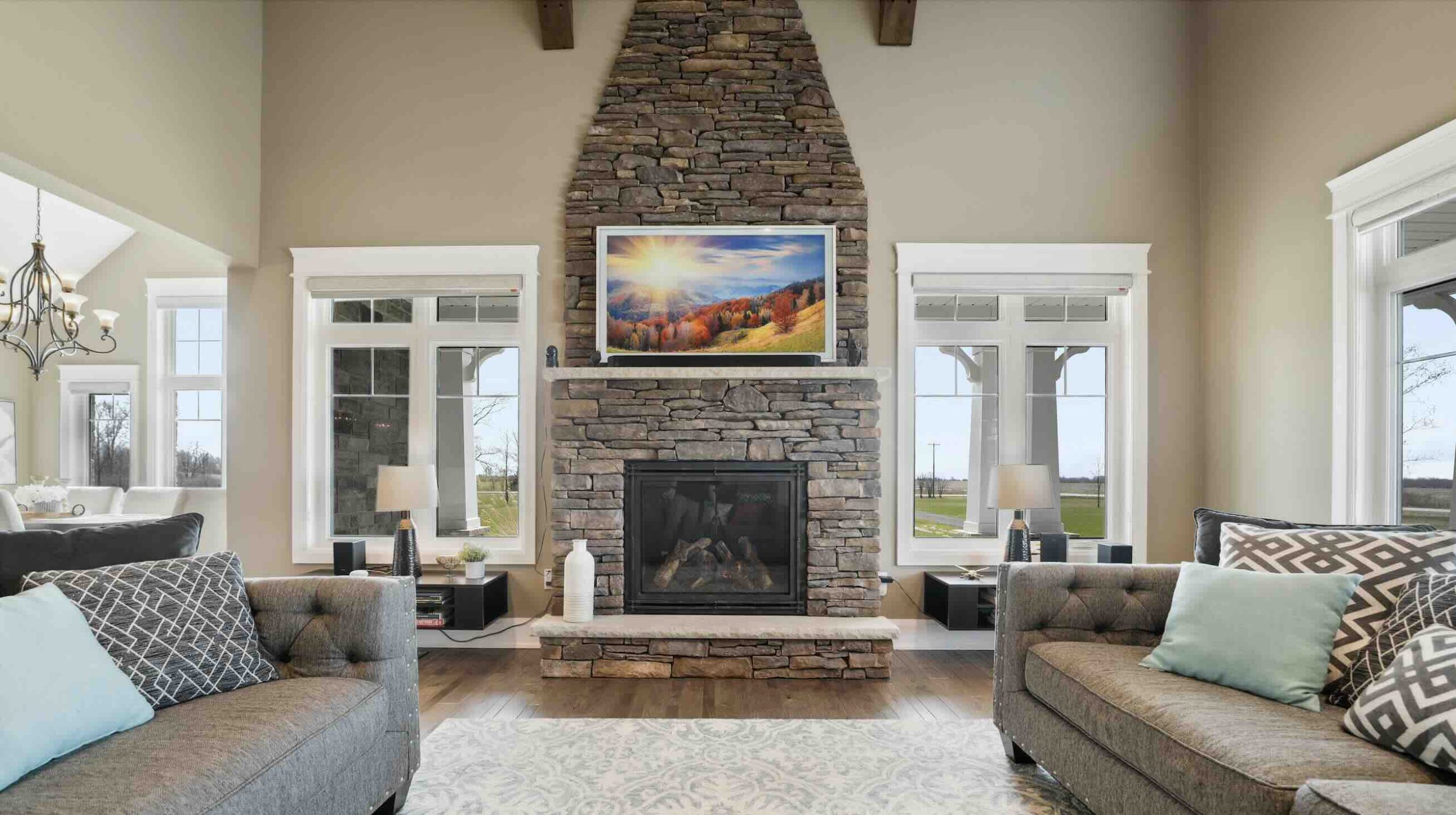 Living room of Luxury Bungalow for Sale in Dunnville with huge fireplace