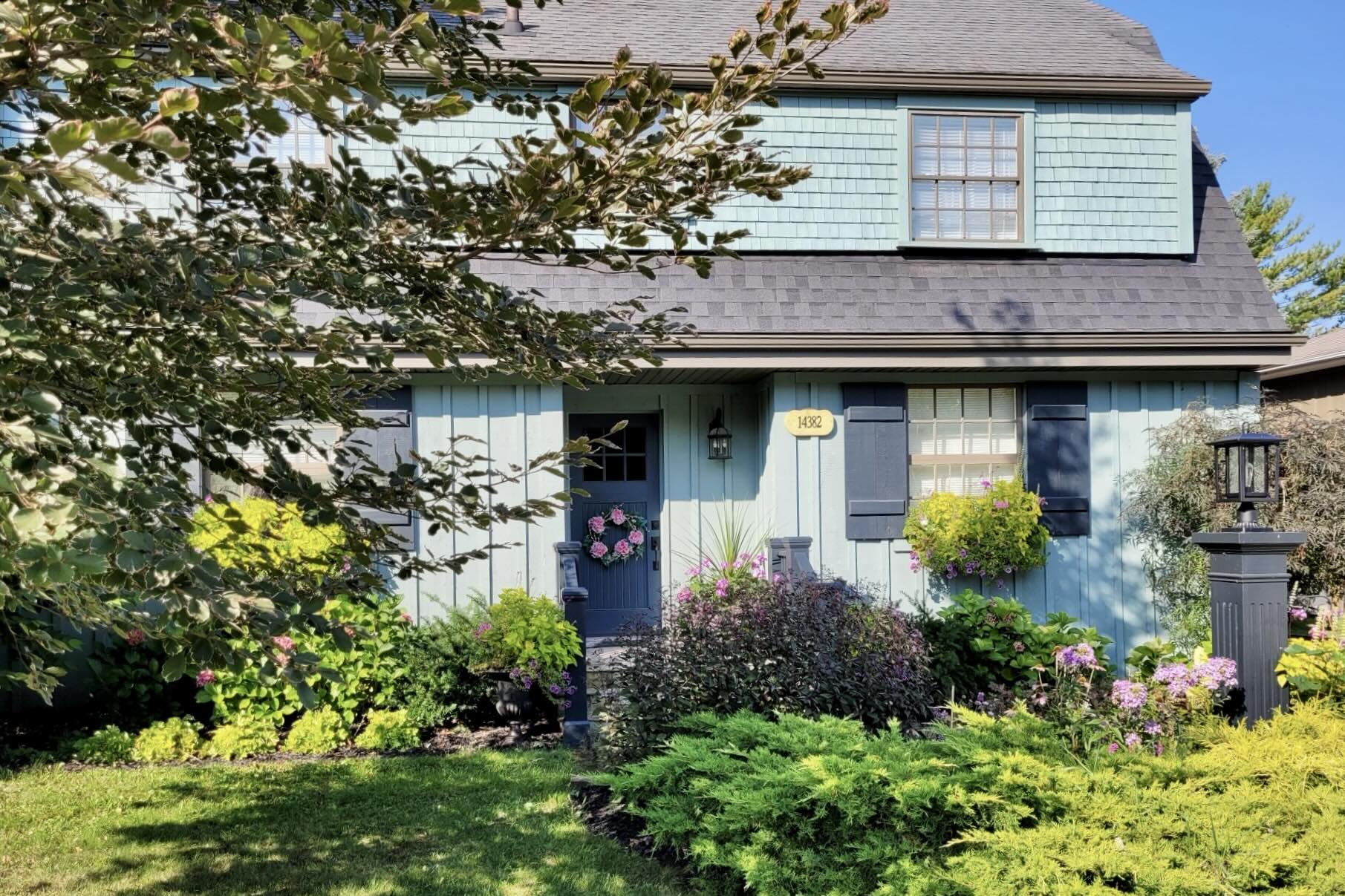 Exterior of this Queenston Village home in summer