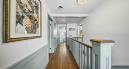 Wood flooring and features extend to the upstairs living spaces