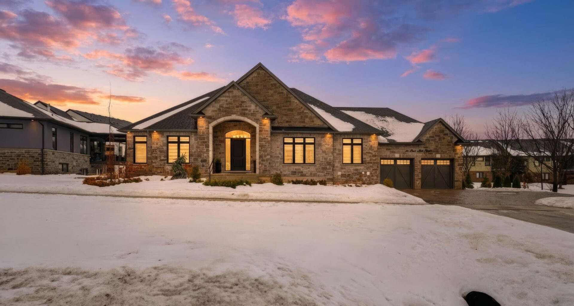 Luxury Home for Sale in St. Davids at sunset in winter with snow